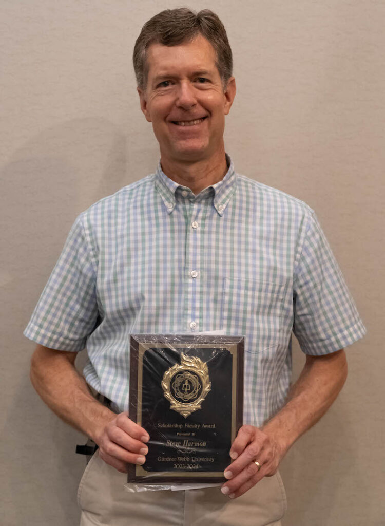 Steve Harmon with award