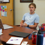 Caleb Roten discusses his project with his mentor