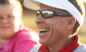 GW Tennis Coach Jim Corn smiling