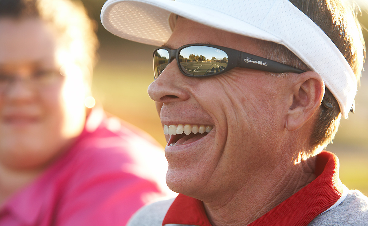 GW Tennis Coach Jim Corn smiling