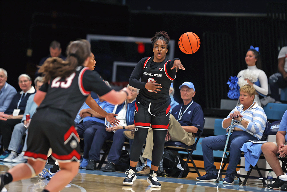 GW baksetball player micahla funderburk passing ball in game