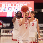 basketball players lineup for a free throw competition