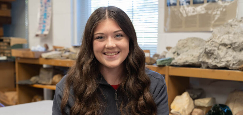 A photo of Ella Simonds in the invertebrate lab.