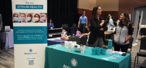 Atrium Health Booth at a recent campus event