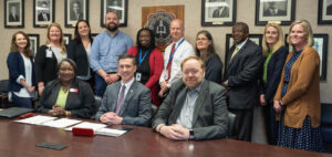 Gardner-Webb Deans and representatives of the Workforce Development Board pose after the signing