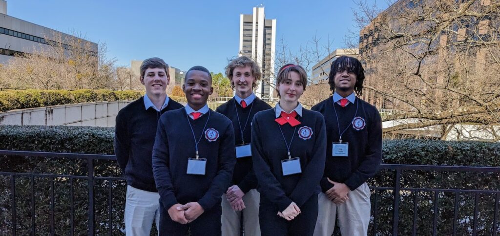 The five members of the Ethics Bowl Team pose in Raleigh