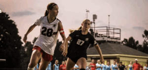women's soccer players on the field
