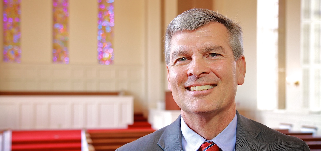 Dean Dr. Robert Canoy poses in Dover Chapel