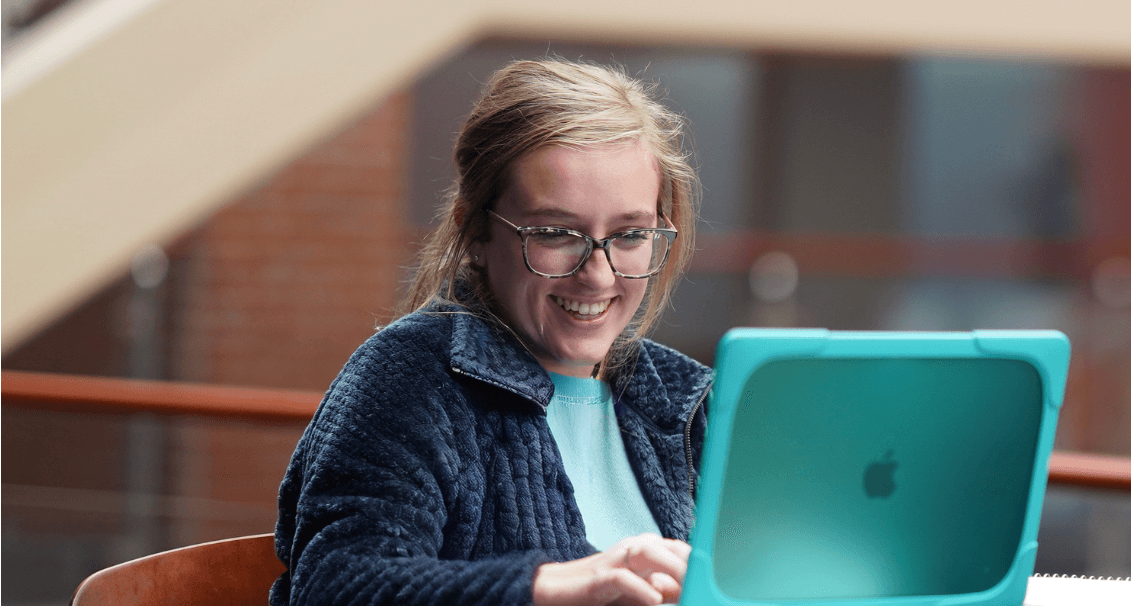 Student looking at laptop screen