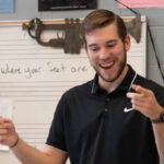 Connor Settlemyre in front of class