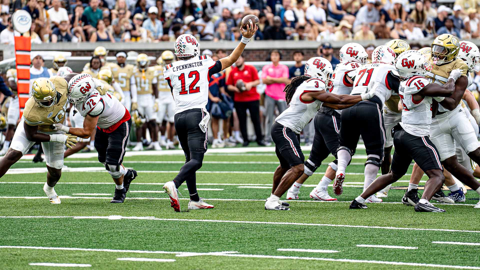 GWU quaterback Pennington throwing football