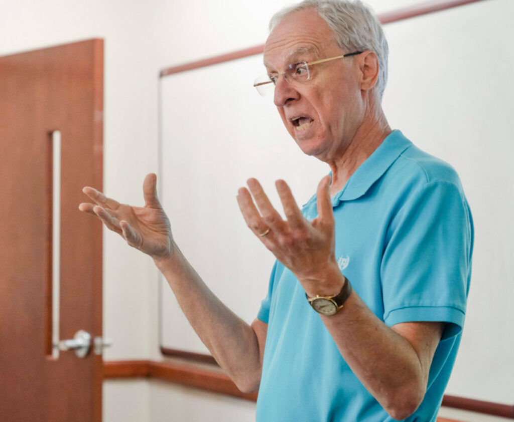 Dr. David Yelton speaks in front of class