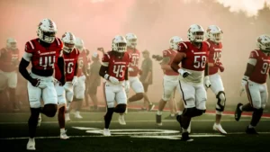 Gardner-Webb Football Running through Smoke