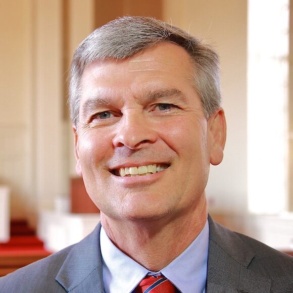 Dean Dr. Robert Canoy poses in Dover Chapel