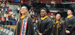 fall commencement - graduates enter the arena