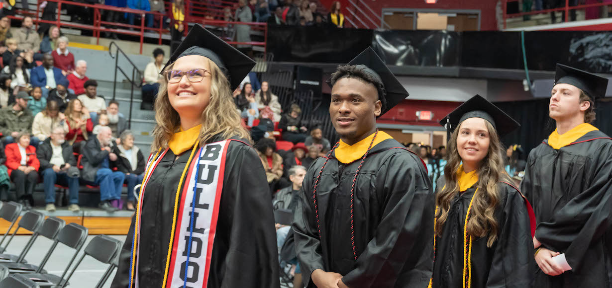 fall commencement - graduates enter the arena