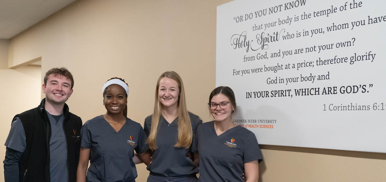 Four PA Students who were chosen for clinical rotation at MD Anderson pose for a photo