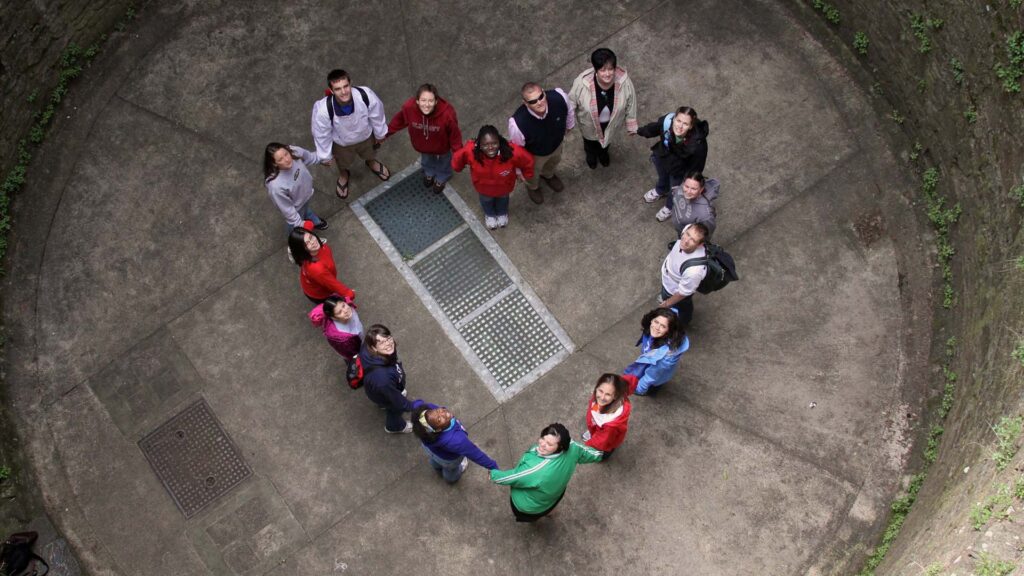 gwu community holding hands heart.jpg