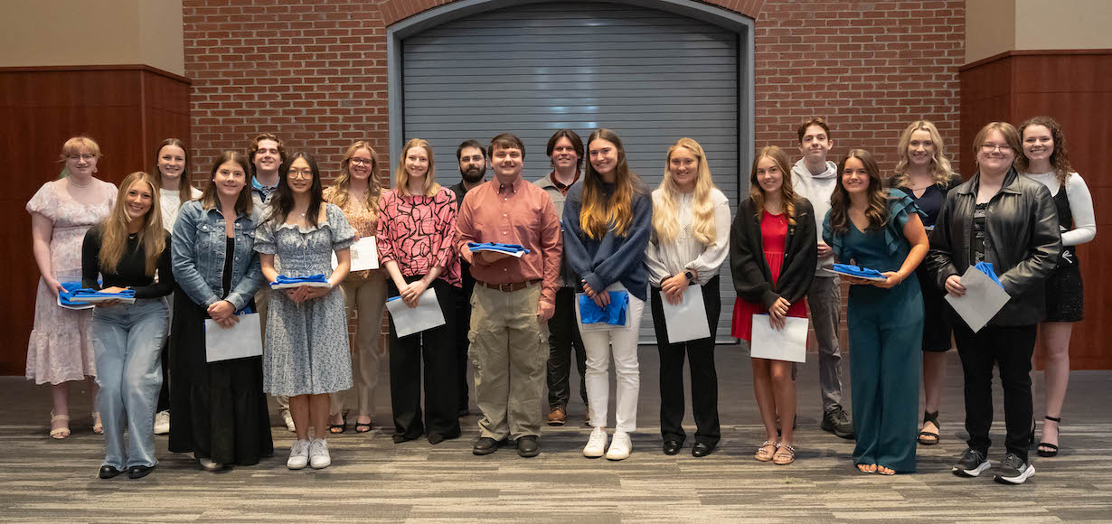 The 24 New members inducted into Sigma Zeta pose for a photo
