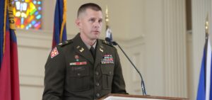 memorial day speaker Lt. Col. Michael A. Cooper speaking in Dover Chapel