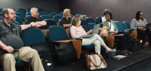 Participants in the Grant-Writing Class wait to present their proposals