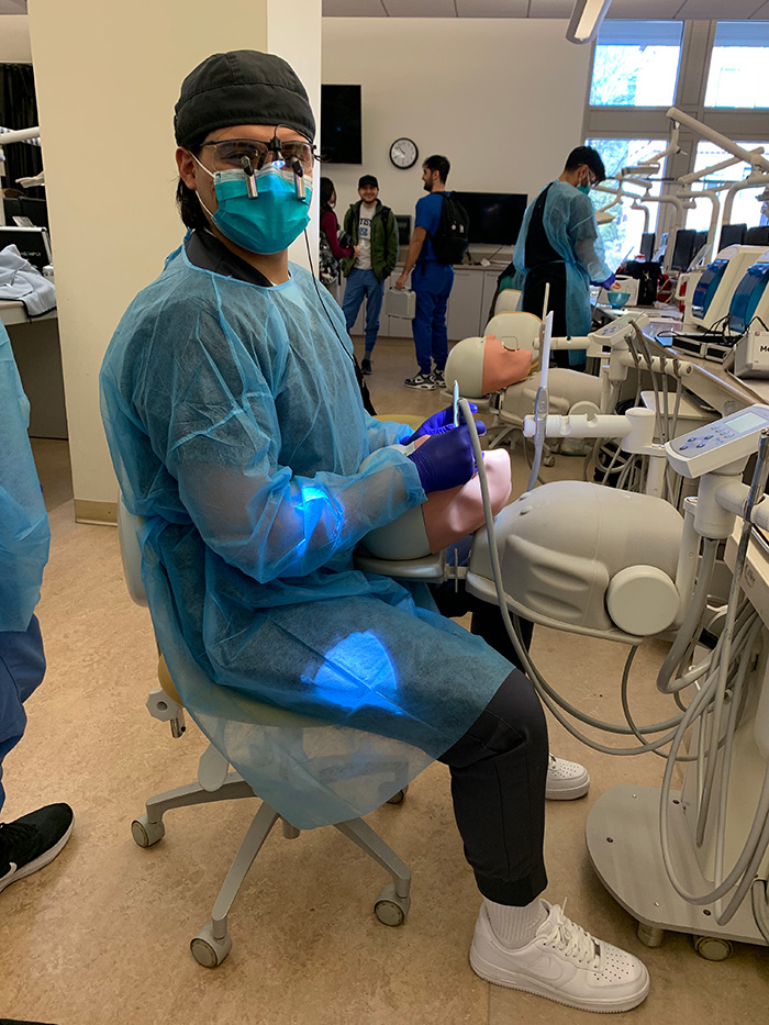 Ulises Martin CebaIlos practicing dentistry in lab