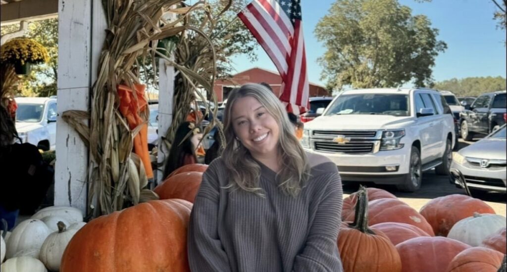 Jessica Greene poses at a fall market