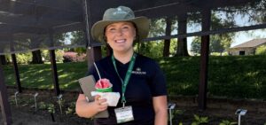 Mollie Fuller poses at Metrolina Greenhouses