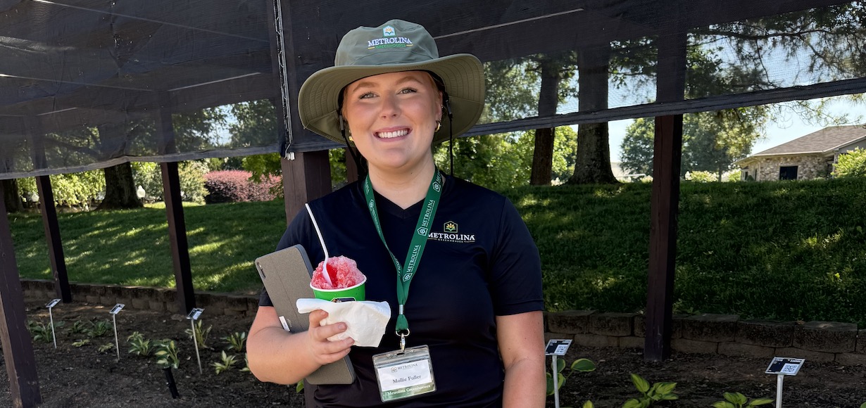 Mollie Fuller poses at Metrolina Greenhouses