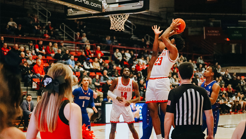 GWU Men's basketball team playing a game.