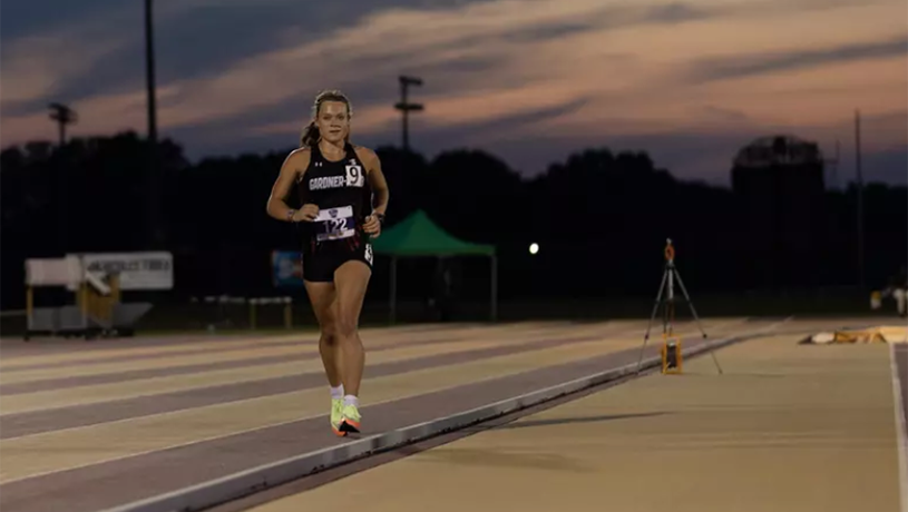A male student on the women's track and field team.