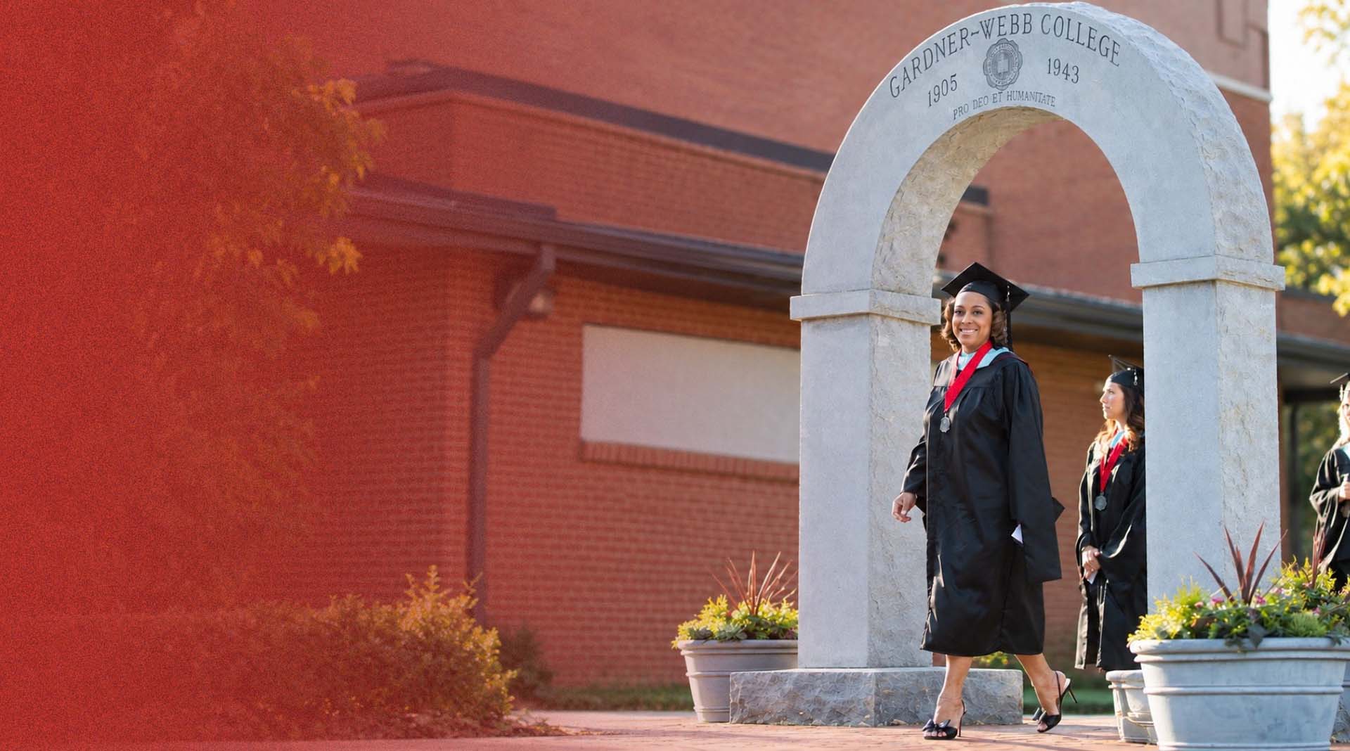 gwu female student walking through arch red gradient x